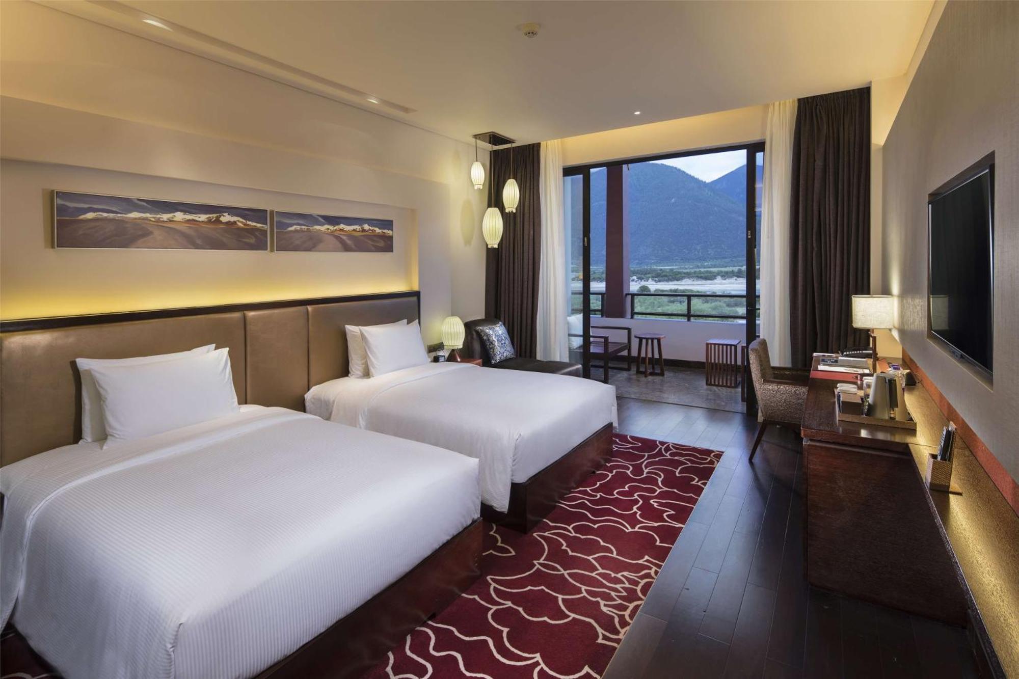 Hilton Linzhi Resort Nyingchi Bagian luar foto