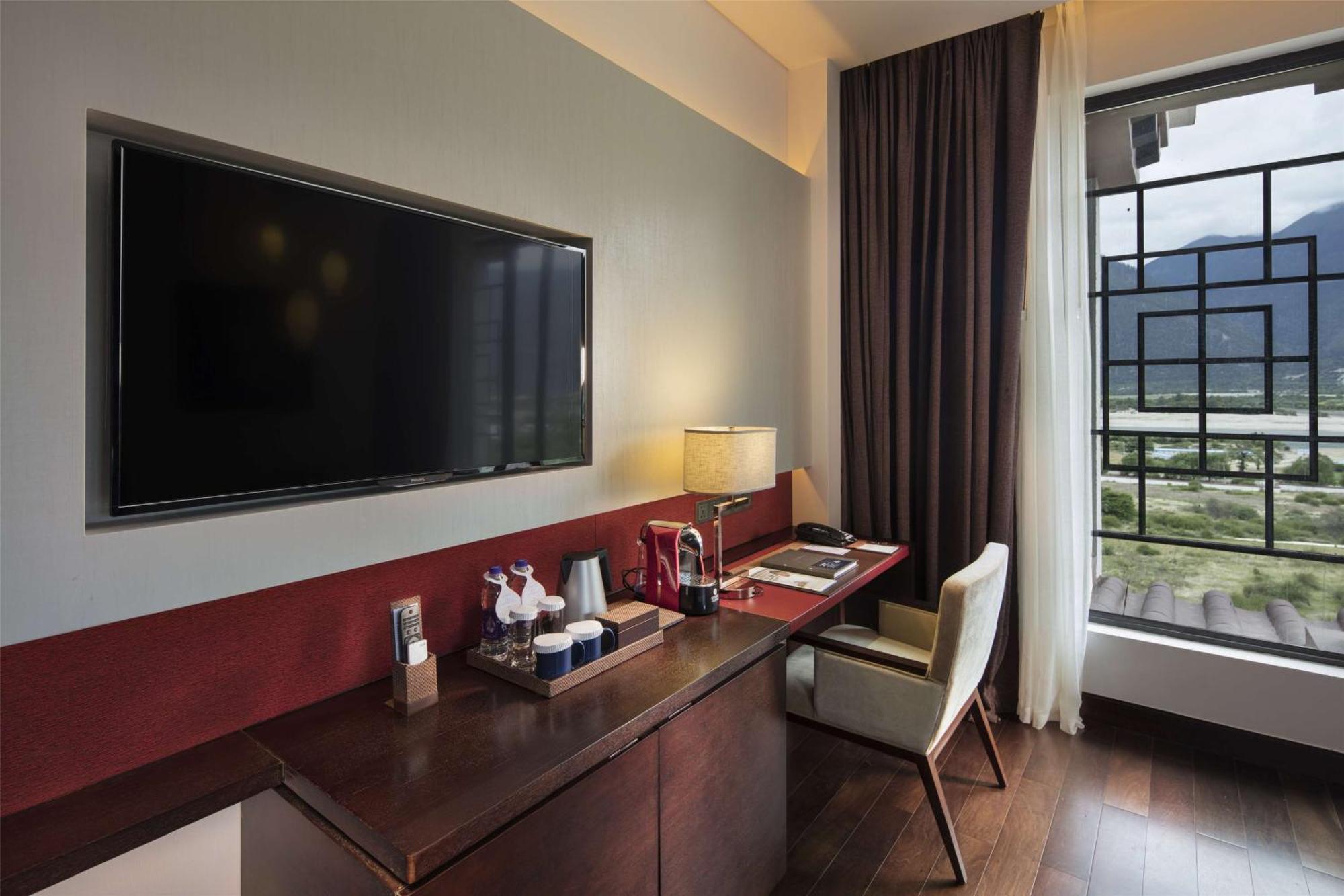 Hilton Linzhi Resort Nyingchi Bagian luar foto